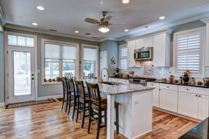 Beautiful kitchen remodel with granite countertops, stainless appliances and hardwood floors.
